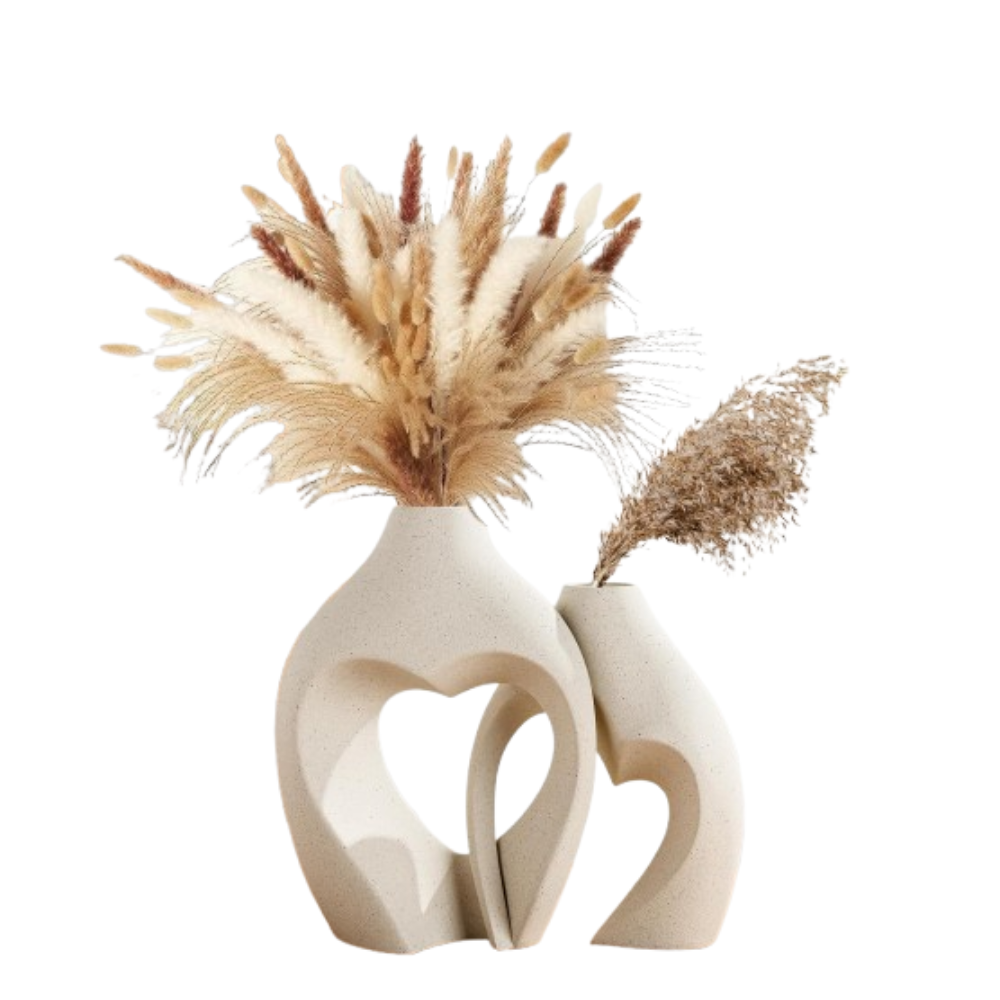 Decorative vase with dried pampas grass on a white background