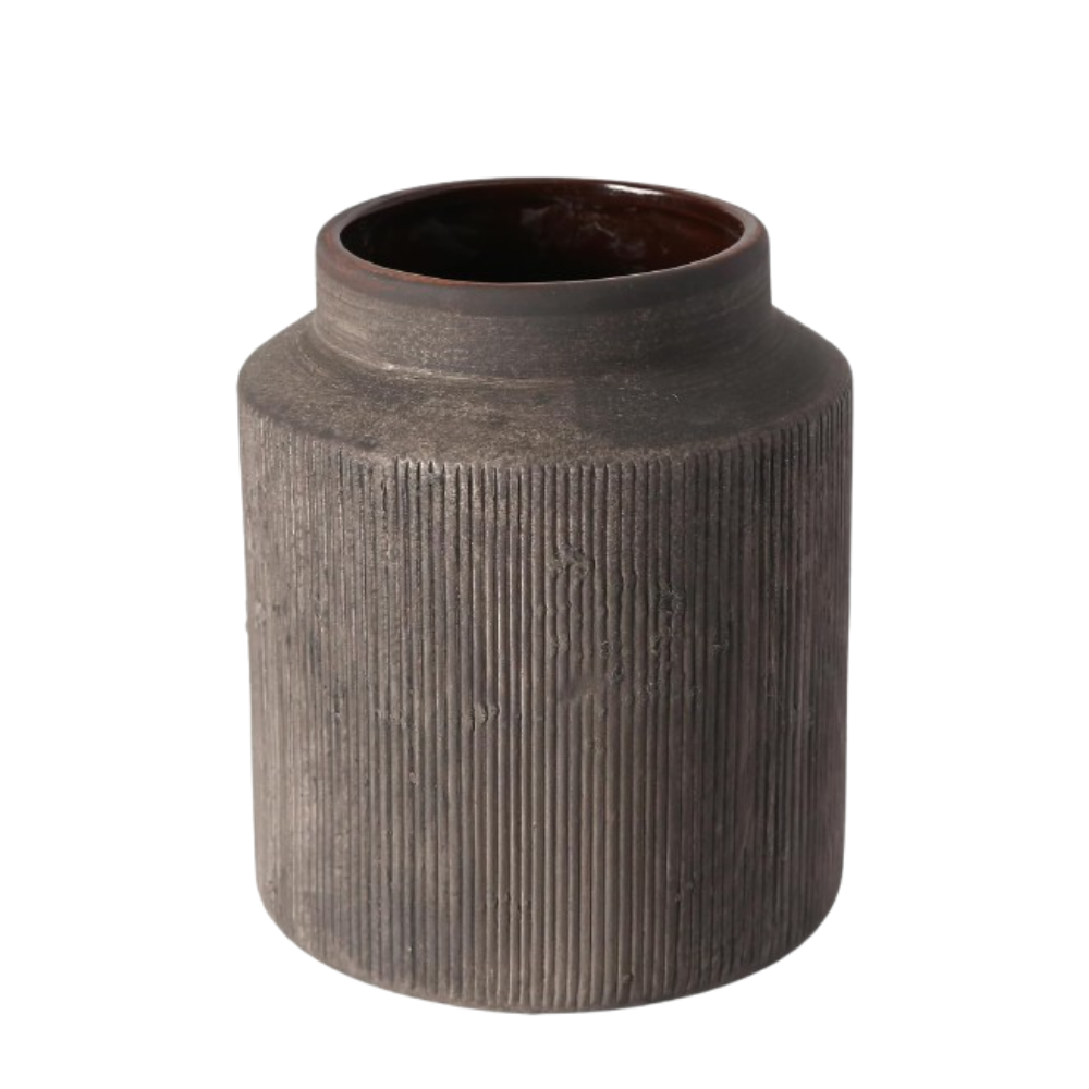 Textured brown ceramic jar on a white background
